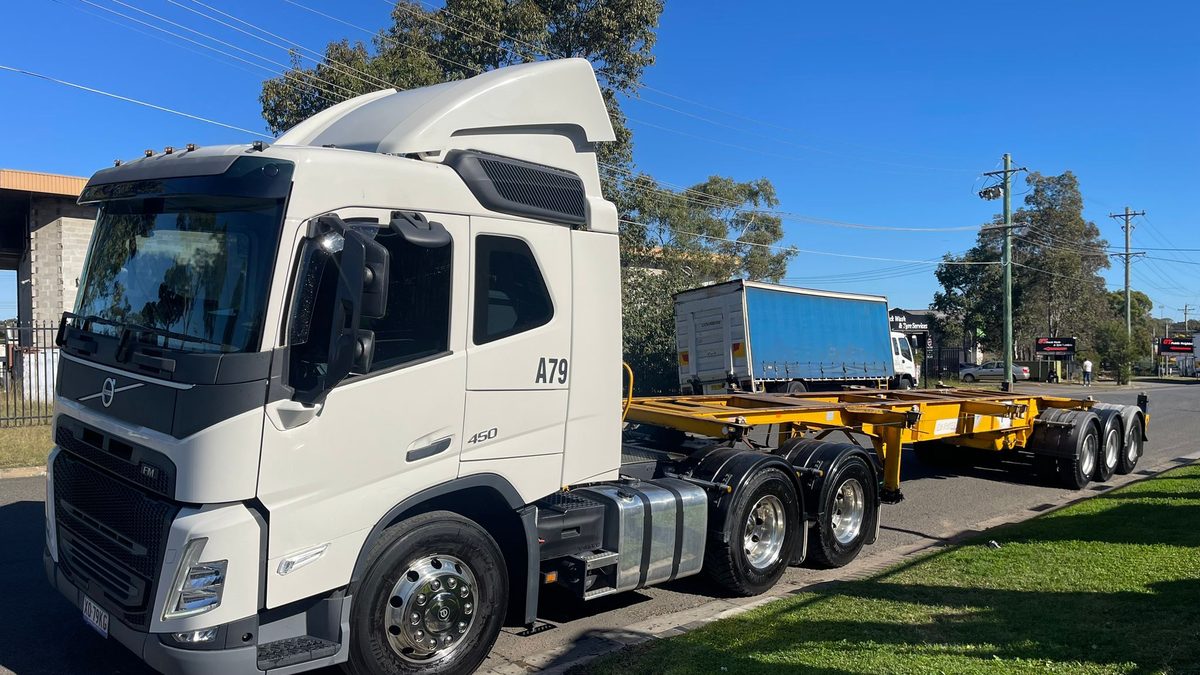 An Aardiv prime mover coupled to a skeletal container trailer